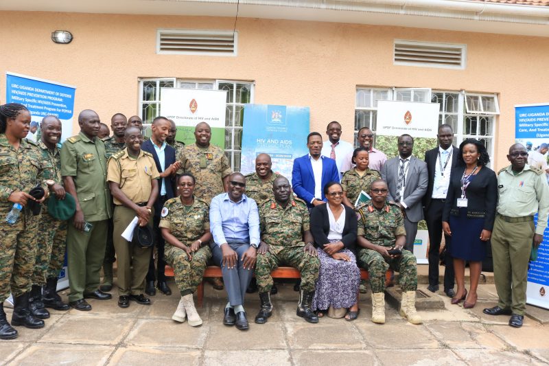 Dr. Fred Magala – MUWRP’s PEPFAR Program Director seated – 2nd left with the team that attended the launch of the UPDF’s HIV/AIDS strategic plan and the handover of the vehicle